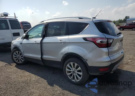 2017 Ford Escape Titanium z USA, uszkodzony, nr VIN 1FMCU9J98HUA58277